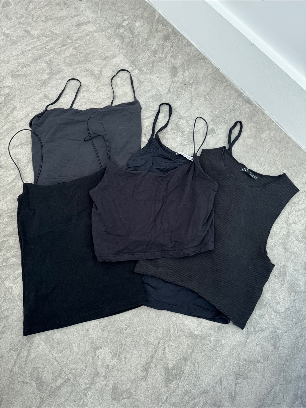 Bundle of black camisole tank tops